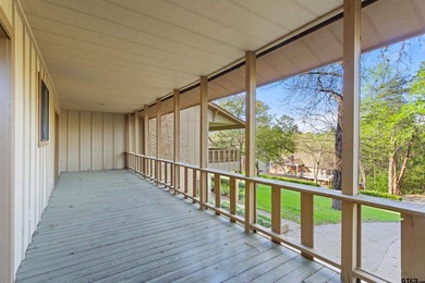 Stunning Hideaway Lake Retreat with Partial Water Views on Hide-A-Way Lake Golf Course in Texas - for sale on GolfHomes.com, golf home, golf lot