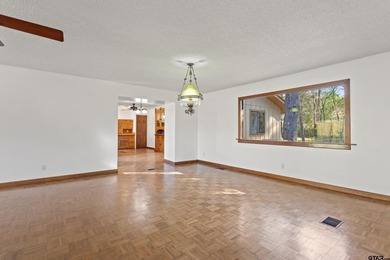 Stunning Hideaway Lake Retreat with Partial Water Views on Hide-A-Way Lake Golf Course in Texas - for sale on GolfHomes.com, golf home, golf lot