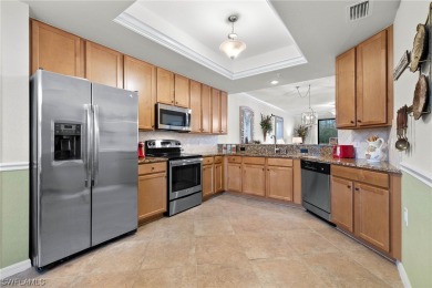 Check out this amazing price for an end unit with golf on Bonita National Golf Course in Florida - for sale on GolfHomes.com, golf home, golf lot