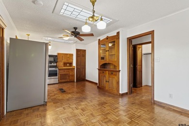 Stunning Hideaway Lake Retreat with Partial Water Views on Hide-A-Way Lake Golf Course in Texas - for sale on GolfHomes.com, golf home, golf lot