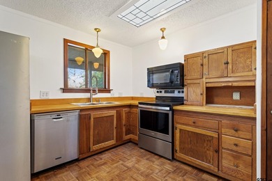 Stunning Hideaway Lake Retreat with Partial Water Views on Hide-A-Way Lake Golf Course in Texas - for sale on GolfHomes.com, golf home, golf lot