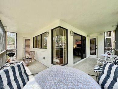 Beautiful first-floor end-unit Golf villa in the sought-after on PGA National Golf Club in Florida - for sale on GolfHomes.com, golf home, golf lot