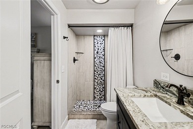 Welcome home to this beautifully fully renovated 3-bedroom on Golfview Golf and Racquet Club in Florida - for sale on GolfHomes.com, golf home, golf lot