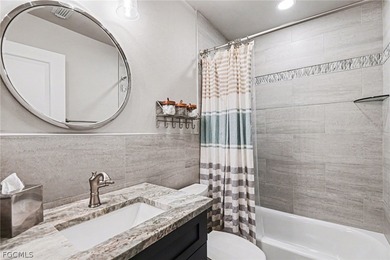 Welcome home to this beautifully fully renovated 3-bedroom on Golfview Golf and Racquet Club in Florida - for sale on GolfHomes.com, golf home, golf lot