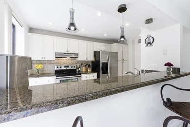 Beautiful first-floor end-unit Golf villa in the sought-after on PGA National Golf Club in Florida - for sale on GolfHomes.com, golf home, golf lot