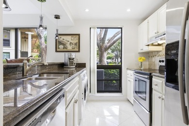 Beautiful first-floor end-unit Golf villa in the sought-after on PGA National Golf Club in Florida - for sale on GolfHomes.com, golf home, golf lot