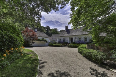 High on a hill overlooking the verdant rolling landscape of one on Oyster Harbors Club in Massachusetts - for sale on GolfHomes.com, golf home, golf lot