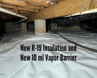 Don't miss walking over the bridge to this wonderful on Devils Ridge Golf Club in North Carolina - for sale on GolfHomes.com, golf home, golf lot