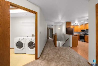 Discover the perfect blend of comfort and convenience in this on Prairie Green Golf Course in South Dakota - for sale on GolfHomes.com, golf home, golf lot