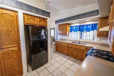 Nestled at 7820 E Devils Arch Dr, Kingman, Arizona, this on Valle Vista Golf Course in Arizona - for sale on GolfHomes.com, golf home, golf lot