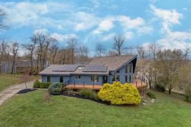 Perched above Hidden Valley Lake, this stunning 3bd,3ba A-Frame on Hidden Valley Golf Club in Indiana - for sale on GolfHomes.com, golf home, golf lot