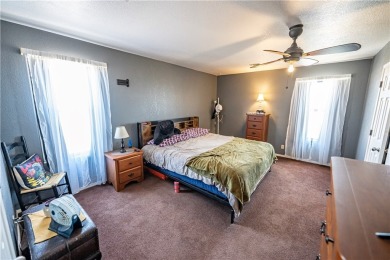 Nestled at 7820 E Devils Arch Dr, Kingman, Arizona, this on Valle Vista Golf Course in Arizona - for sale on GolfHomes.com, golf home, golf lot