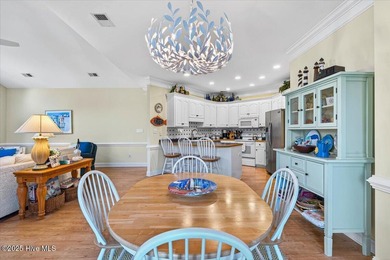 Waterfront overlooking a tranquil pond, this exquisitely on Members Club At St. James Plantation in North Carolina - for sale on GolfHomes.com, golf home, golf lot