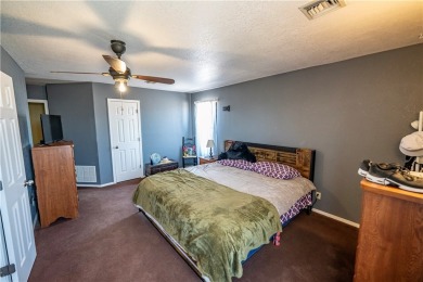 Nestled at 7820 E Devils Arch Dr, Kingman, Arizona, this on Valle Vista Golf Course in Arizona - for sale on GolfHomes.com, golf home, golf lot