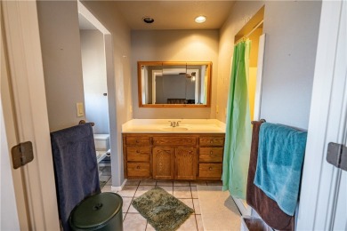 Nestled at 7820 E Devils Arch Dr, Kingman, Arizona, this on Valle Vista Golf Course in Arizona - for sale on GolfHomes.com, golf home, golf lot