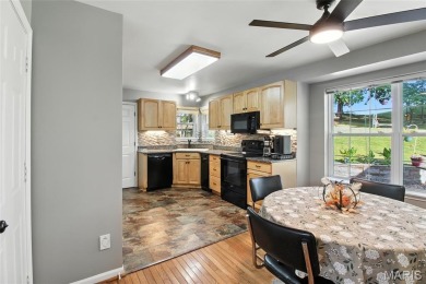 WOW! This beautifully built home on the 13th hole of Raintree on Raintree Country Club in Missouri - for sale on GolfHomes.com, golf home, golf lot