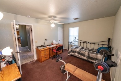 Nestled at 7820 E Devils Arch Dr, Kingman, Arizona, this on Valle Vista Golf Course in Arizona - for sale on GolfHomes.com, golf home, golf lot