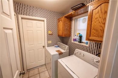 Nestled at 7820 E Devils Arch Dr, Kingman, Arizona, this on Valle Vista Golf Course in Arizona - for sale on GolfHomes.com, golf home, golf lot