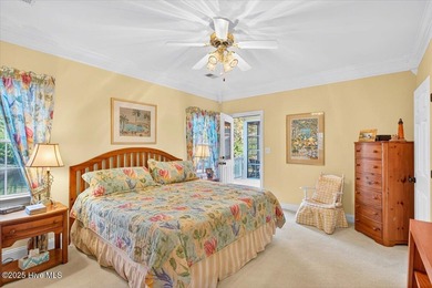 Waterfront overlooking a tranquil pond, this exquisitely on Members Club At St. James Plantation in North Carolina - for sale on GolfHomes.com, golf home, golf lot