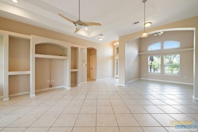 Step into comfort and style in this inviting golf course home on South Padre Island Golf Club in Texas - for sale on GolfHomes.com, golf home, golf lot