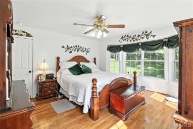 WOW! This beautifully built home on the 13th hole of Raintree on Raintree Country Club in Missouri - for sale on GolfHomes.com, golf home, golf lot