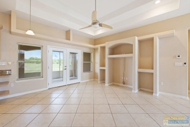 Step into comfort and style in this inviting golf course home on South Padre Island Golf Club in Texas - for sale on GolfHomes.com, golf home, golf lot