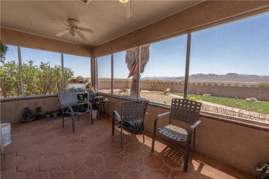 Nestled at 7820 E Devils Arch Dr, Kingman, Arizona, this on Valle Vista Golf Course in Arizona - for sale on GolfHomes.com, golf home, golf lot