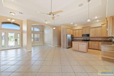 Step into comfort and style in this inviting golf course home on South Padre Island Golf Club in Texas - for sale on GolfHomes.com, golf home, golf lot