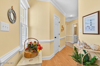 Waterfront overlooking a tranquil pond, this exquisitely on Members Club At St. James Plantation in North Carolina - for sale on GolfHomes.com, golf home, golf lot