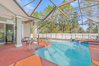 Enjoy Summer Evenings On The Enormous Screened Lanai With Heated on Royal St. Augustine Golf and Country Club in Florida - for sale on GolfHomes.com, golf home, golf lot