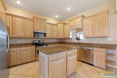 Step into comfort and style in this inviting golf course home on South Padre Island Golf Club in Texas - for sale on GolfHomes.com, golf home, golf lot