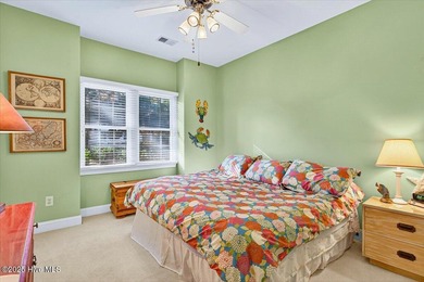 Waterfront overlooking a tranquil pond, this exquisitely on Members Club At St. James Plantation in North Carolina - for sale on GolfHomes.com, golf home, golf lot