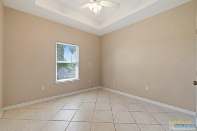 Step into comfort and style in this inviting golf course home on South Padre Island Golf Club in Texas - for sale on GolfHomes.com, golf home, golf lot