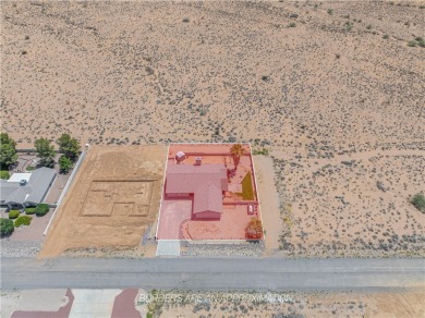 Nestled at 7820 E Devils Arch Dr, Kingman, Arizona, this on Valle Vista Golf Course in Arizona - for sale on GolfHomes.com, golf home, golf lot