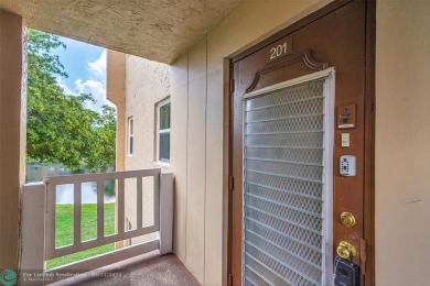 55+ COMMUNITY, THIS TURN KEY READY UNIT IS ON THE 2nd FLOOR on Sunrise Lakes Phase III in Florida - for sale on GolfHomes.com, golf home, golf lot
