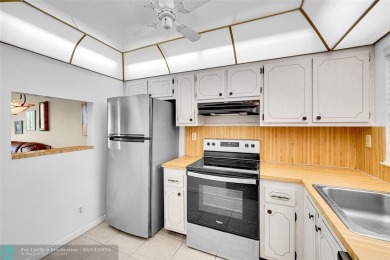 55+ COMMUNITY, THIS TURN KEY READY UNIT IS ON THE 2nd FLOOR on Sunrise Lakes Phase III in Florida - for sale on GolfHomes.com, golf home, golf lot