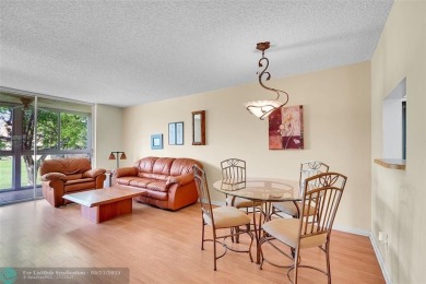 55+ COMMUNITY, THIS TURN KEY READY UNIT IS ON THE 2nd FLOOR on Sunrise Lakes Phase III in Florida - for sale on GolfHomes.com, golf home, golf lot
