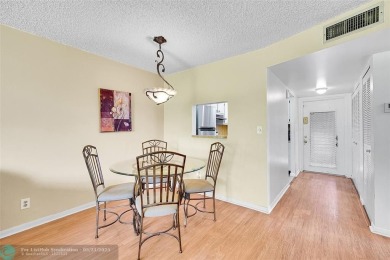 55+ COMMUNITY, THIS TURN KEY READY UNIT IS ON THE 2nd FLOOR on Sunrise Lakes Phase III in Florida - for sale on GolfHomes.com, golf home, golf lot