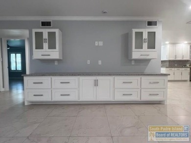 STUNNING 5 bedroom, 4.5 bath open concept with a kitchen that on Harlingen Country Club in Texas - for sale on GolfHomes.com, golf home, golf lot