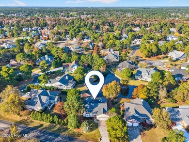 Waterfront overlooking a tranquil pond, this exquisitely on Members Club At St. James Plantation in North Carolina - for sale on GolfHomes.com, golf home, golf lot
