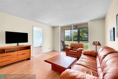 55+ COMMUNITY, THIS TURN KEY READY UNIT IS ON THE 2nd FLOOR on Sunrise Lakes Phase III in Florida - for sale on GolfHomes.com, golf home, golf lot