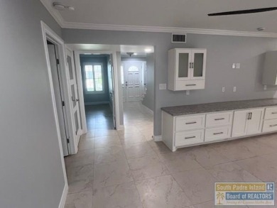 STUNNING 5 bedroom, 4.5 bath open concept with a kitchen that on Harlingen Country Club in Texas - for sale on GolfHomes.com, golf home, golf lot