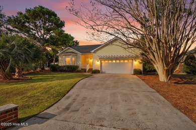 Waterfront overlooking a tranquil pond, this exquisitely on Members Club At St. James Plantation in North Carolina - for sale on GolfHomes.com, golf home, golf lot