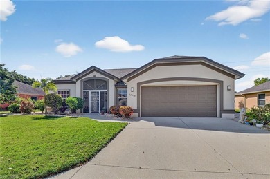 Welcome home to this beautiful Florida retreat with breezy Key on Fountain Lakes Community Golf Course in Florida - for sale on GolfHomes.com, golf home, golf lot