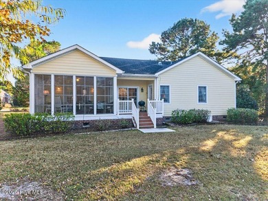 Waterfront overlooking a tranquil pond, this exquisitely on Members Club At St. James Plantation in North Carolina - for sale on GolfHomes.com, golf home, golf lot
