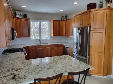 Beautifully updated, great location, Georgetown Township taxes on Gleneagle Golf Club in Michigan - for sale on GolfHomes.com, golf home, golf lot