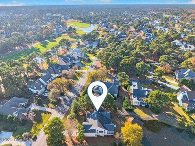 Waterfront overlooking a tranquil pond, this exquisitely on Members Club At St. James Plantation in North Carolina - for sale on GolfHomes.com, golf home, golf lot