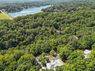 WOW! This beautifully built home on the 13th hole of Raintree on Raintree Country Club in Missouri - for sale on GolfHomes.com, golf home, golf lot