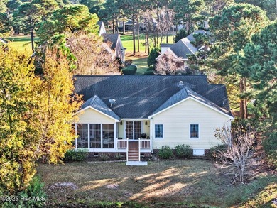 Waterfront overlooking a tranquil pond, this exquisitely on Members Club At St. James Plantation in North Carolina - for sale on GolfHomes.com, golf home, golf lot