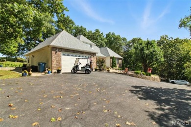 WOW! This beautifully built home on the 13th hole of Raintree on Raintree Country Club in Missouri - for sale on GolfHomes.com, golf home, golf lot
